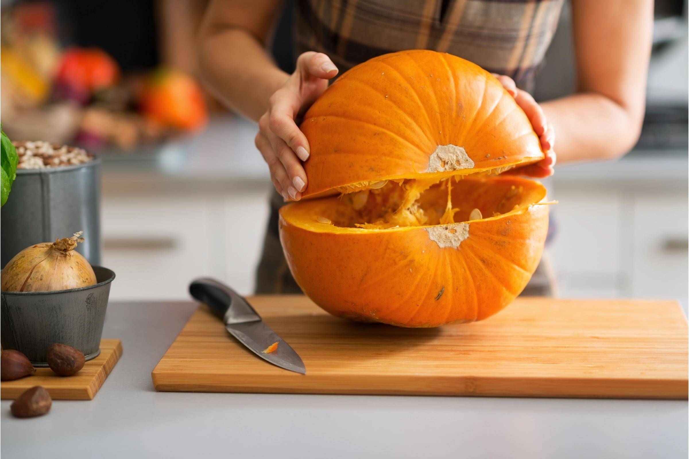 cutting pumpkin with knife